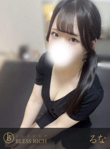Young woman with dark hair in a black dress seated, face blurred for anonymity, promotional logo at bottom reading 'BLESS RICH'.