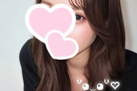 Portrait of a woman with long brown hair, a pink heart sticker covering part of her face, wearing a black top, with the Bless Rich logo at the bottom.